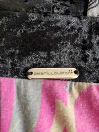 Precioso top de manga larga.