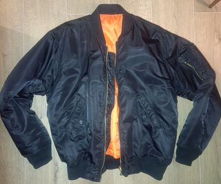 Chaqueta Bomber Bandit Negra Naranja reversible.