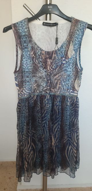 Vestido nuevo sin estrenar con etiqueta. Tela muy 