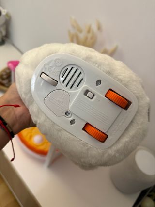 Oca de peluche con casita