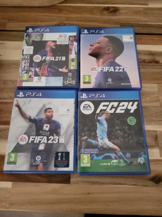 PS4 (PlayStation 4) Negra + Mando + Juegos