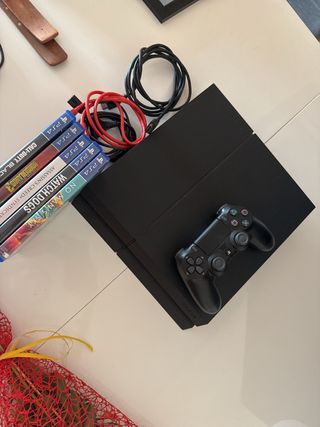 PS4 Negra + 5 Juegos + Disco 1TB