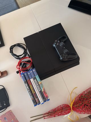 PS4 Negra + 5 Juegos + Disco 1TB