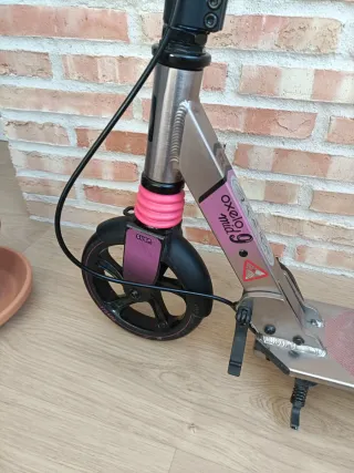 Patinete oxelo mid 9 rosa y morado