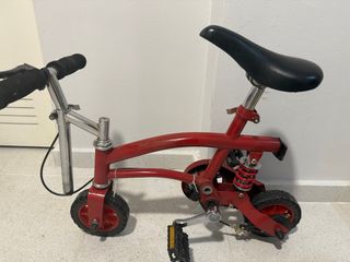 Mini bici de circo roja