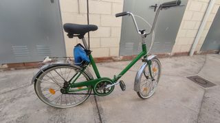 Bicicleta plegable antigua señora verde