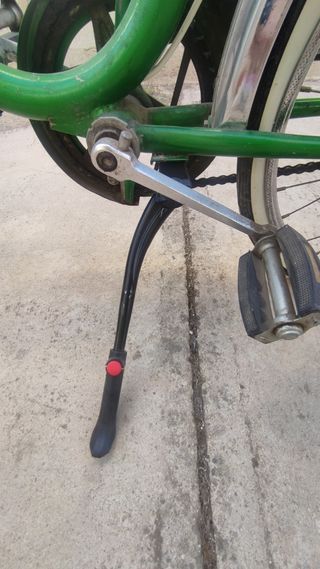 Bicicleta plegable antigua señora verde