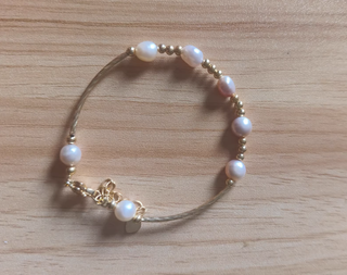 Pulsera de perlas y oro