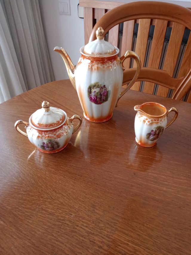 Juego de cafè porcelana, 12 tazas  naranja y blanc