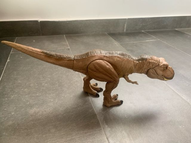 Dinosaurio T-Rex marrón