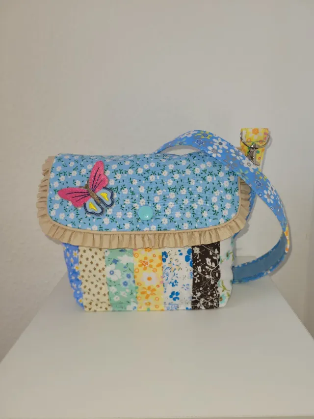Bolso de tela patchwork con mariposa