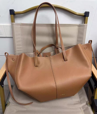 Bolso tote Polène Cyme grande de mano