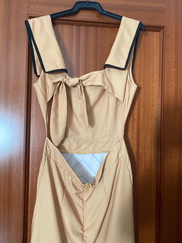 Vestido beige con estampado geométrico