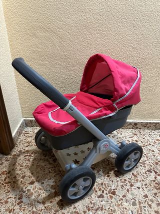Carrito de bebé rosa y gris