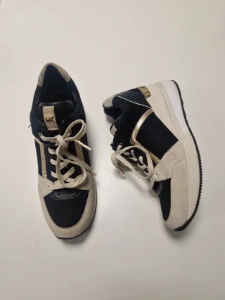 Zapatillas Michael Kors cuña beige, negro y dorado