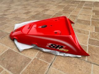 Carena sella Aprilia SR 50 Rossifumi '99