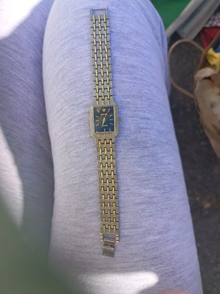 Reloj Rolex Dorado y Negro