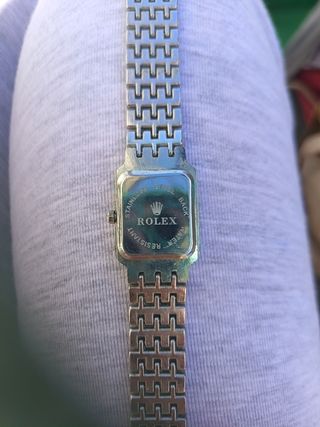 Reloj Rolex Dorado y Negro