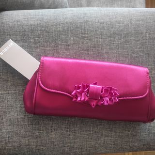 Cartera de mano ceremonia fucsia