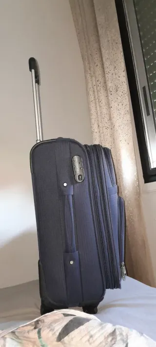 Maleta de viaje azul marino