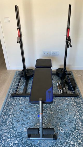 Banco de pesas con soporte y discos