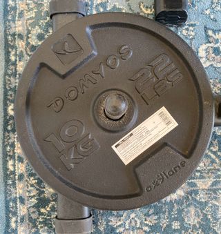 Banco de pesas con soporte y discos