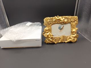 Portafoto dorato con angeli