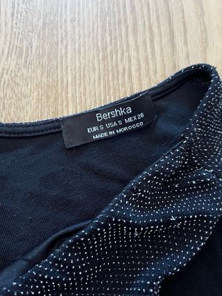 Top Bershka negro brillos cruzado Talla S