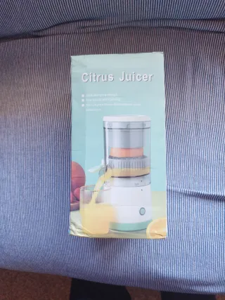 Exprimidor automático eléctrico