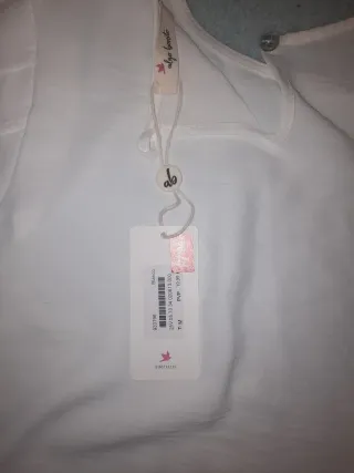 Blusa blanca de tirantes con volantes