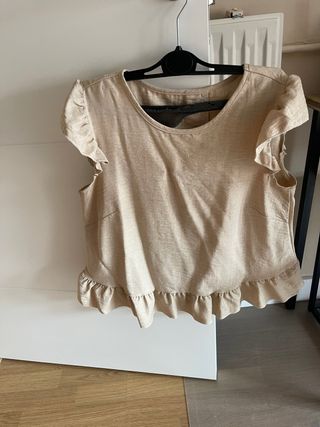 Blusa beige con volantes