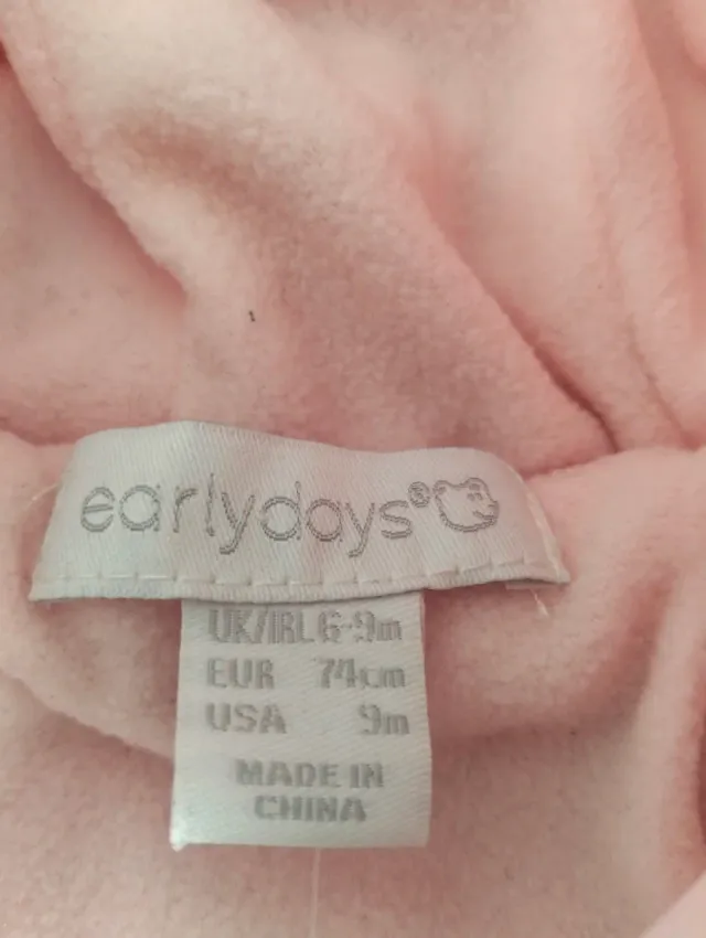 Mono bebé niña rosa con etiqueta T. 6-9