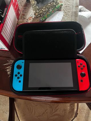 Nintendo Switch Poco Usada Azul/Rojo