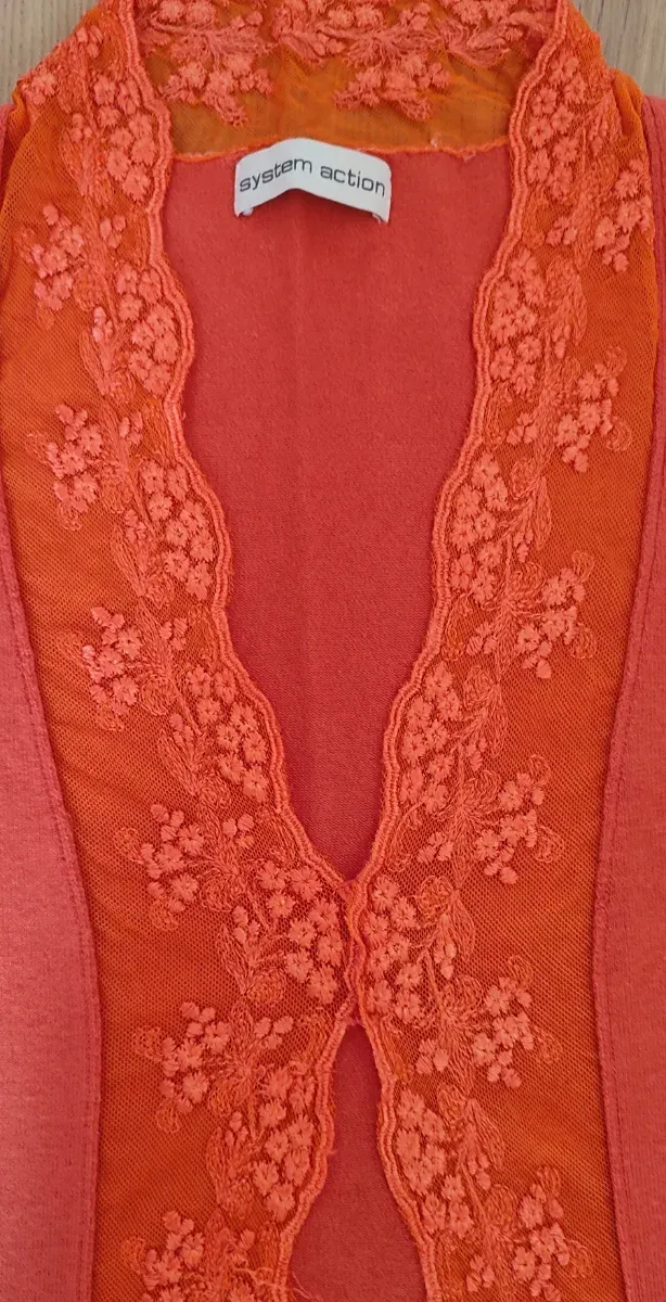 Rebeca cárdigan naranja con encaje