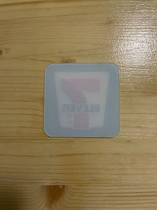 Targhetta logo 7-Eleven design bianco