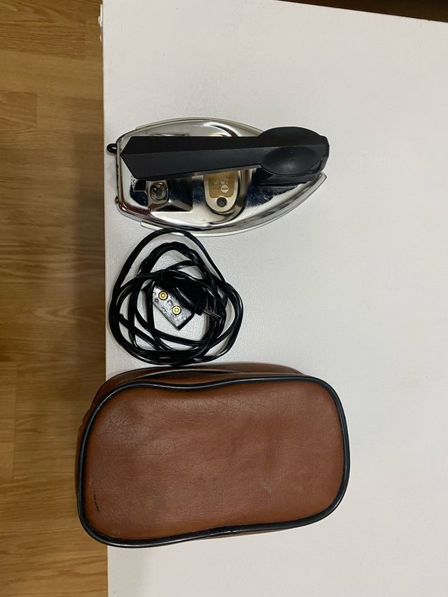 Plancha de viaje vintage poco uso