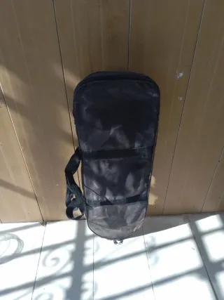  monopatín con funda