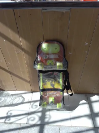  monopatín con funda