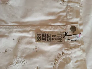 Mini gonna bianca strappata. Misure come da foto