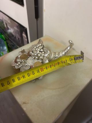 Cornucopia in argento con monete