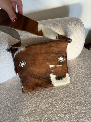 Bolso piel con pelo animal print