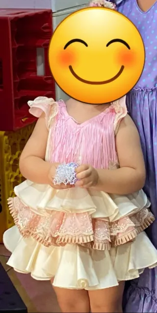 Traje de flamenca niña beige y rosa
1 a 2 años