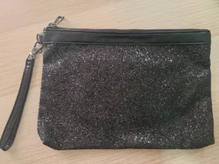Bolso de mano con brillos negro y plata