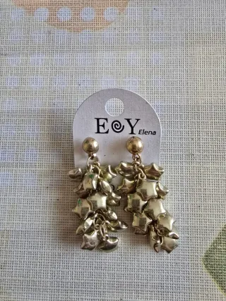 Pendientes E©Y Elena estrellas doradas