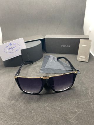 Occhiali da sole Prada neri e oro