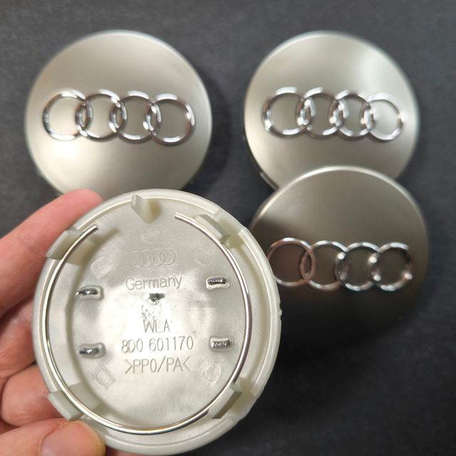 TAPABUJES AUDI 68mm GRIS - EMBLEMA LLANTAS AUDI