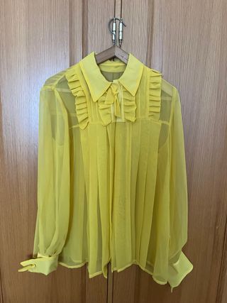 Blusa gasa amarilla con volantes