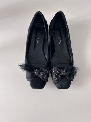 Bailarinas pelo y plumas negras