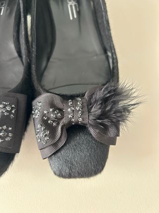 Bailarinas pelo y plumas negras