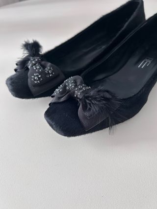 Bailarinas pelo y plumas negras